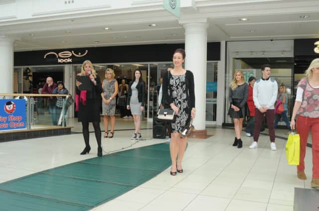 A 'Fashion Flash Mob' performed an Autumn fashion show at Royal Priors on Saturday. The Presenter was former model Julie Froggatt. 
MHLC-21-09-13 Fashion show Sep67