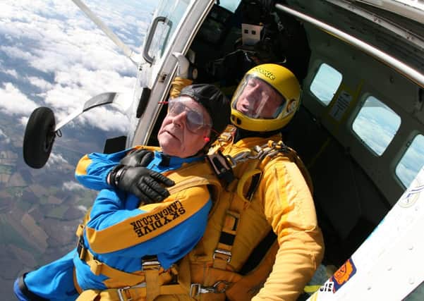 Barry Goddard, 75, did a skydive to raise money for Parkinson's UK.