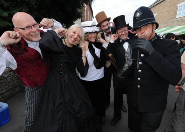 A Victorian street fayre organised by the school PTA was held in Harbury on Saturday.
Constable Richard Woodcock blows his whistle, much to the chagrin of revellers Brian Young, Julie Young, Katherine Giblin, Chris Beaton and Steve Gowland.
MHLC-05-10-13 Victorian Oct07