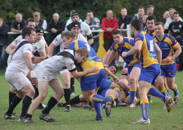 Jake Dodd goes on a charge for Kenilworth in their Midlands One West encounter with Burton.