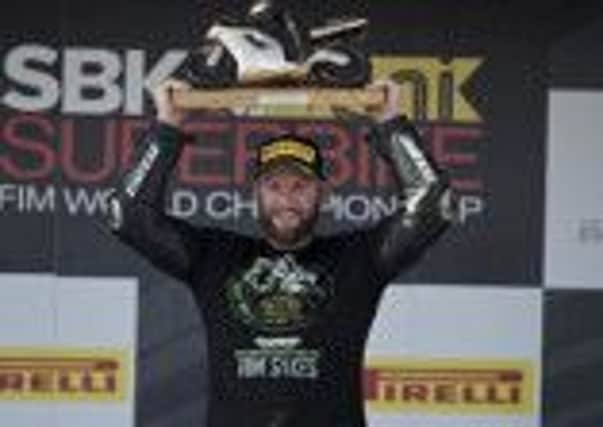 Tom Sykes celebrates his World Superbike title in Jerez, Spain.
