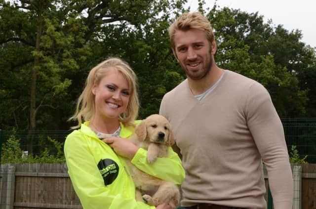 England Rugby captain Chris Robshaw and his girlfriend, classical singer Camilla Kerslake, at the Guide Dogs Breeding Centre in Bishops Tachbrook.