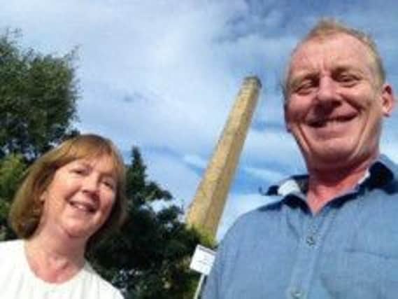 Liz Leigh and Steve Huison outside Saltaire Mill, Saltaire, Leeds.