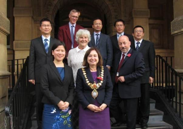 Town mayor Judith Clarke with the visitors from Shanghai.