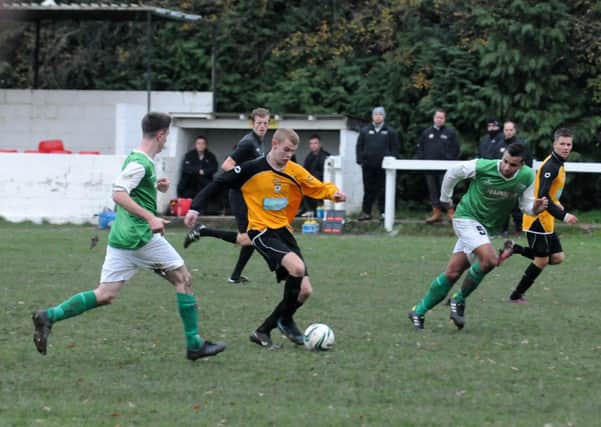 Josh Tiff looks to create an opening for Racing Club Warwick during their 3-1 home defeat to league leaders Brocton on Saturday. MHLC-23-11-13 Racing Club Nov97