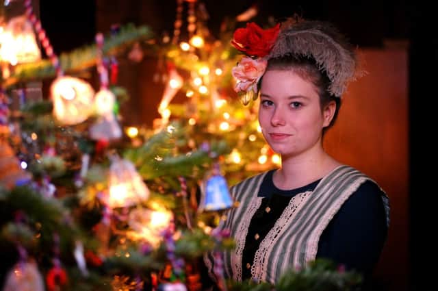 Christmas tree displays are being prepared for later this week, at St. Mary's Church, Warwick.

Pictured: Rachel Pethick dressed in Victorian costume.