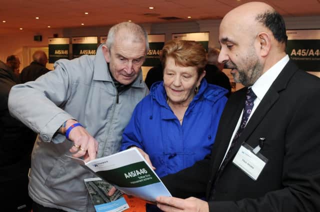 Project manager Paul Nagra talking to Diane and Ray Watters at the public exhibition.