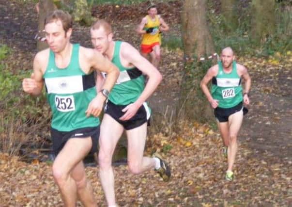 Rich Simkiss leads Phil Gould and Chris McCarthy up a n incline at the Birmingham League Cross Country meeting. Picture: Joan Andrew