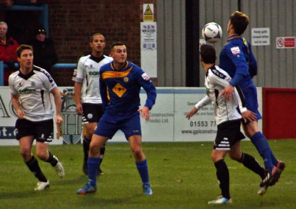 Craig Owen challenges James Rogers for the ball as Josh Hawker looks on. Picture: Sally Ellis