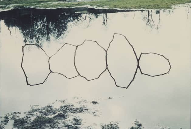 Forked Twigs In Water - bentham (1979) by Andy Goldsworthy, part of the Uncommon Ground exhibition at the Mead Gallery.