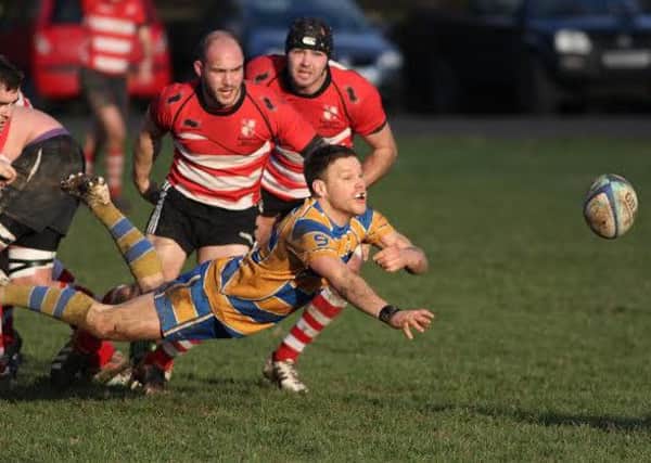 Toby Lord spreads the play during Old Leamingtonians Midlands Two West (South) clash with Earlsdon. Picture: Tim Nunan