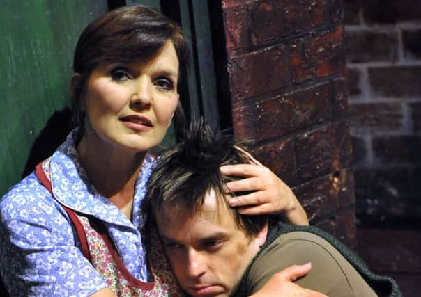 Maureen Nolan as Mrs Johnstone and Sean Jones as Mickey in Blood Brothers, coming to the Belgrade Theatre.