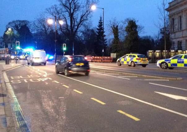 Police park near the River Leam to assist in the river rescue.