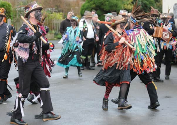 Plumb Jerkum Border Morris annual Wassail around various pups in Long Itchington,They dance then send a boy up a fruit tree to plant a slice of toast, then shoot it! This wards off evil spirits and ensures a good harvest

.MHLC-18-01-14 Morris Jerkum Jan04