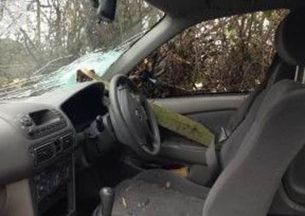A fence post went through the windscreen of a woman's car during an acident in Warwick today (Friday). Photo courtesy of West Midlands Ambulance Service.