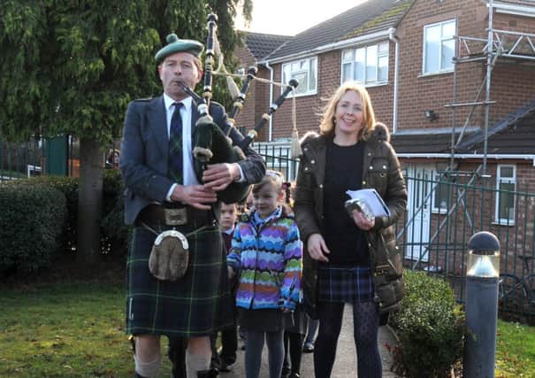 Bagpiper Joe Moore pipes the Emscote children into All Saints school ahead of their combined 'Burns Night' event on Thursday.
MHLC-23-01-14 Burns Night Jan33