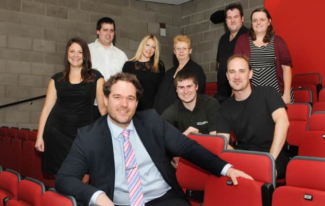 Spa Centre manager David Guilding and staff at the venue's cinema studio, which was refurbished last year.
