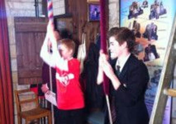 Kineton High School pupils trying their hand at bell-ringing for the Sport Relief event.