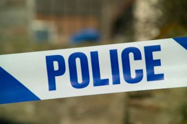 Police have arrested a man following suspicious activity near Aylesford School in Warwick.