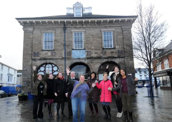 Staff celebrate at the Market Hall Museum in Warwick after winning a national competition. Among those pictured are Rebecca Williams (third left - Learning and Community Engagement Manager) and Michelle Alexander (centre - Museums and Natural Environment Manager). 
MHLC-05-02-14 success feb12