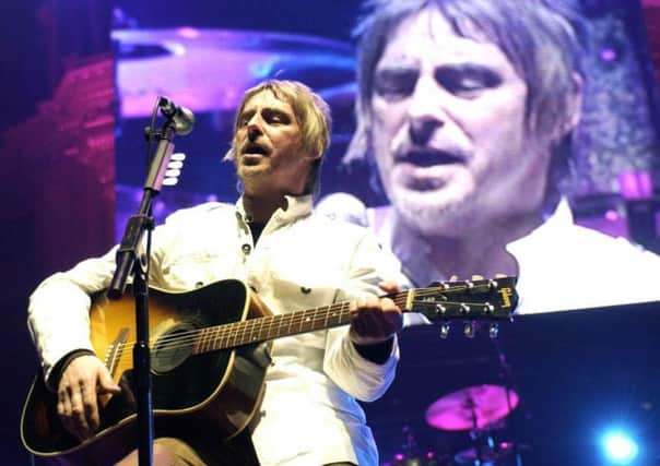 Singer Paul Weller performing  live on stage
