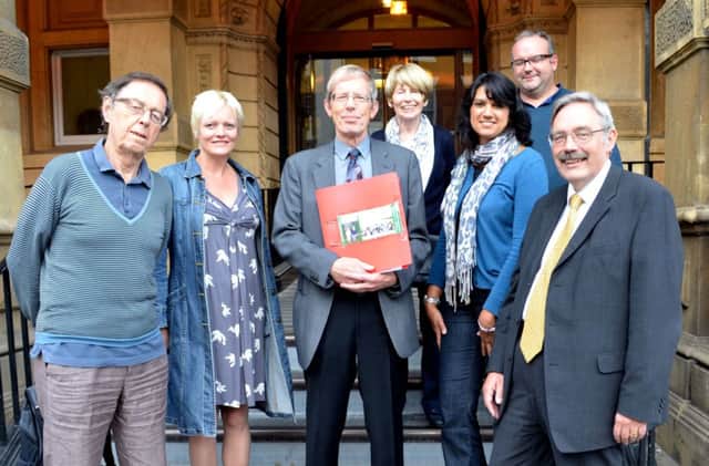 Members of the Friends of Victoria Park with Leamington councillor Bill Gifford handing in their petition last year.