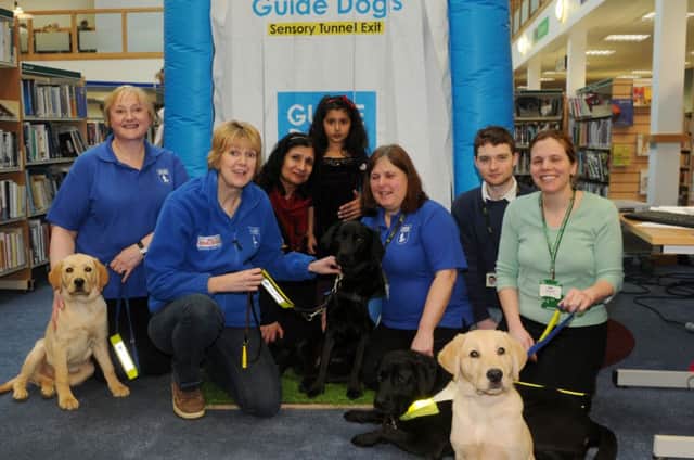 Representatives from the Guide Dogs charity at the Pump Room in Leamington.