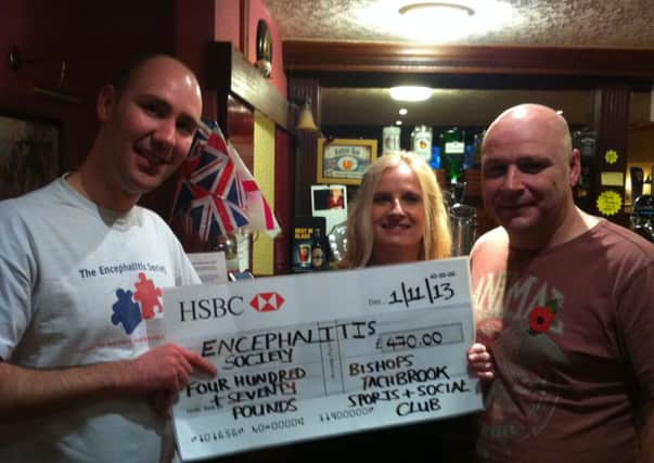James Pratt with Karen Capehorn and Tony Anderson of Bishops Tachbrook Sports and Social Club. The club hosted a fundraising quiz for the The Encephalitis Society which raised £470 for the cause.