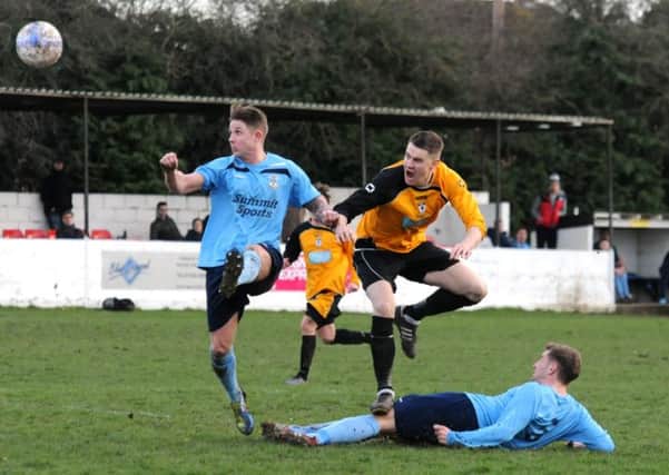 Ryan Langmead is  off target with a header during Racing Club Warwicks 1-0 defeat to Studley last Saturday. 
MHLC-22-02-14 Racing Club Feb39