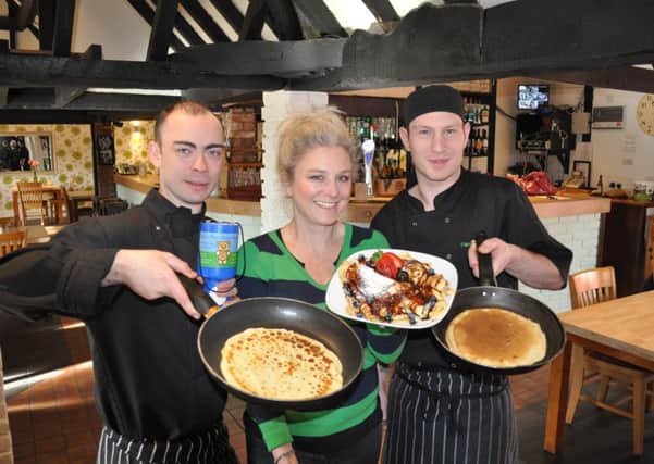 Newbold Comyn Arms owner Sarah Miller and chefs Andrew McNamara and Frank Piazzon get ready for the Shrove Tuesday pancake day event at the pub.