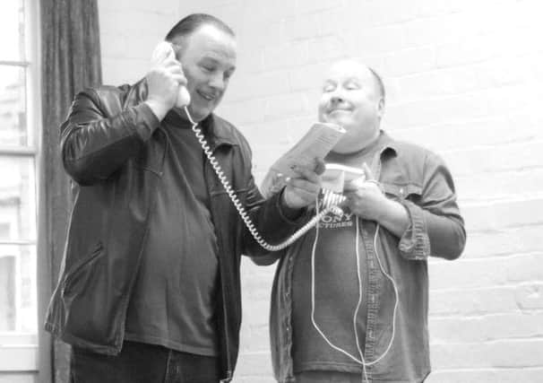 Brian Emeney as playwright Turai and Dean Foy as the steward Dvornichek in Rough Crossing at the Priory Theatre.