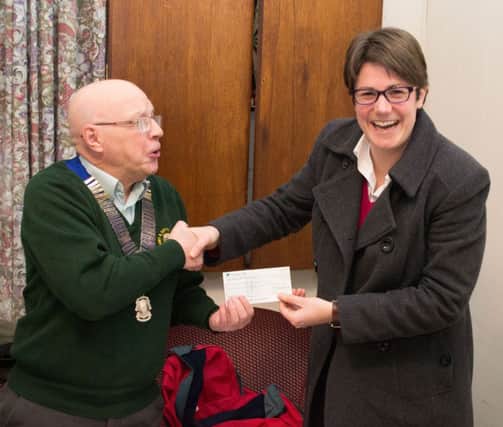 Southam Lions present their donation to Acorns Children's Hospice.