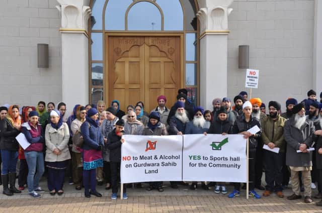 Members of the Sikh community in Warwick district protest against plans for a new community centre at the Gurdwara in Leamington.