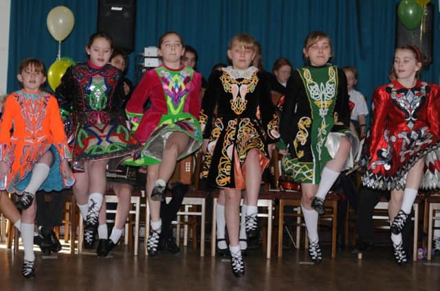 Children from St Joseph's Primary School in Whitnash perform Irish dancing for senior citizens at a lunch to celebrate St Patrick's Day at St Patrick's Irish Club in Leamington.