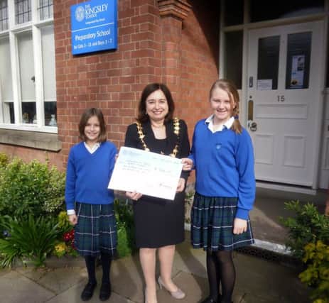 Leamington mayor Cllr Judith Clarke is pictured with the Kingsley Prep charity reps Year 6 girls Bex Wallis (left) and Sophie Stewart.