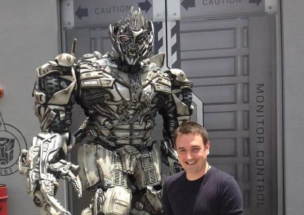 Dan Mallier with his Transformers hero Megatron