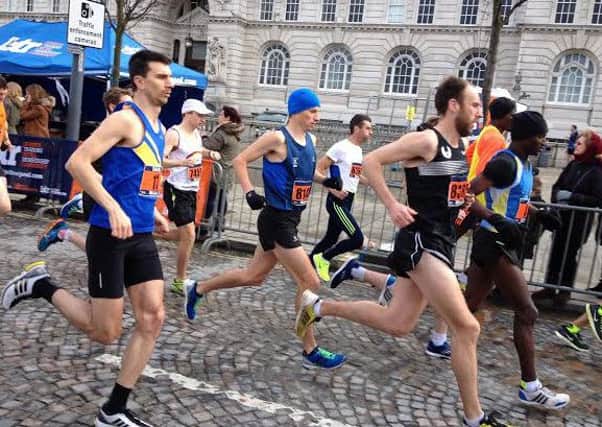 Kenilworth Runners Chris McCarthy (black vest) finished seventh in the Liverpool Half Marathon.