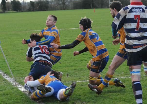 Committed OLs defending prevents Joe Mills getting in at the corner for Banbury. Pictures: Morris Troughton MHLC-22-03-14 OLs Banbury Mar22