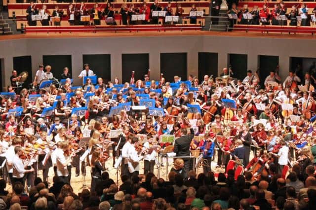 Young musicians in the Warwickshire County Music Service are performing at Birmingham Symphony Hall.