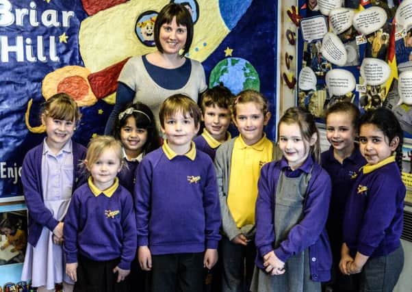 Headteacher Bryony Meek with pupils at Briar Hill Infant School.