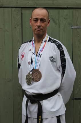 Pc Scott Caswell is now ranked number two in the world at Tae Kwon Do after winign a silver medal in the PUMA Tae Kwon Do World Open Championships.