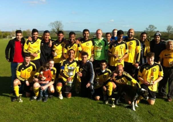 Khalsa celebrate their Division One Cup win.