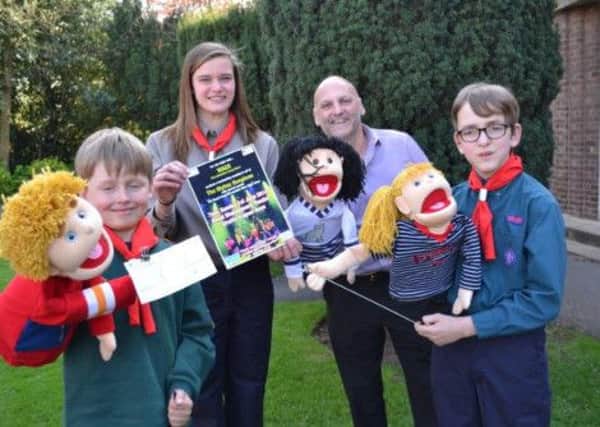 Nigel Adams, community fundraiser for the Myton Hospices, promotes the forthcoming WAGS show with Warwickshire Scouts.