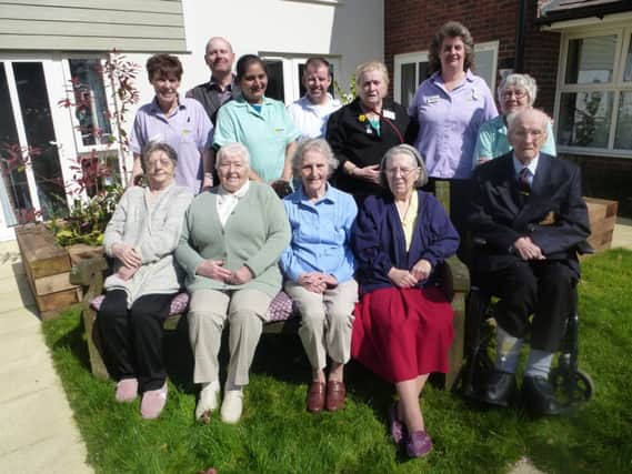 Staff and residents at the Lawns care home in Whitnash celebrate their award from carehome.co.uk