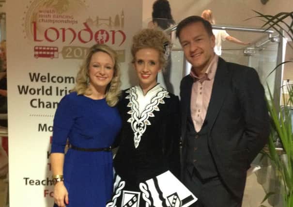 Tara Hart (centre) with her teachers Catriona Bucke and John Carey.