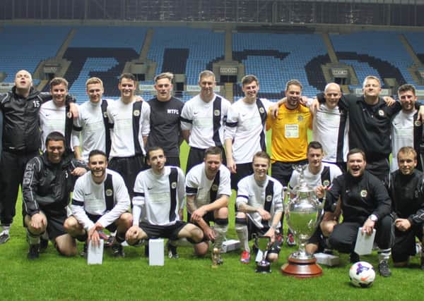 Whitnash celebrate their Coventry Charity Cup success at the Ricoh Arena, the first leg of a potential trophy treble. Picture: David Clough