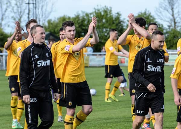Brakes players, including matchwinner Danny Newton, acknowledge the crowd after the final match of the season.