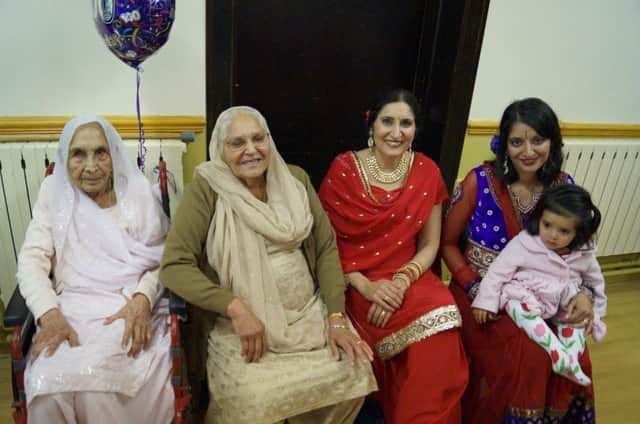 Harnam Kaur celebrates her 100th birthday with her daughter-in-law Resham Kaur Aujla, granddaughter Kulwinder Chahal, great-granddaughter Seetle Dool and great-great-granddaughter Riya Dool