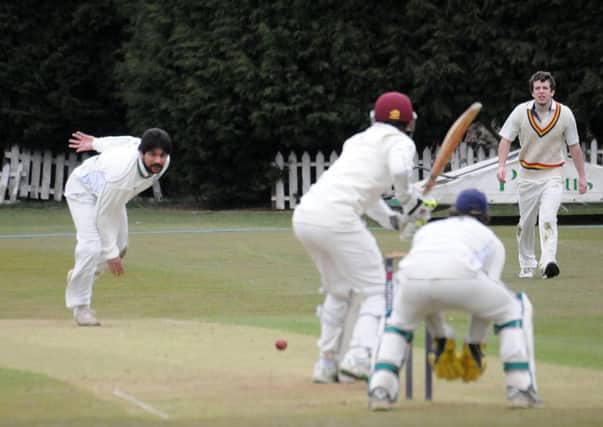 A seaming masterclass from Faisal Khalid helped Leamington win their opening Birmingham League Division Two fixture.