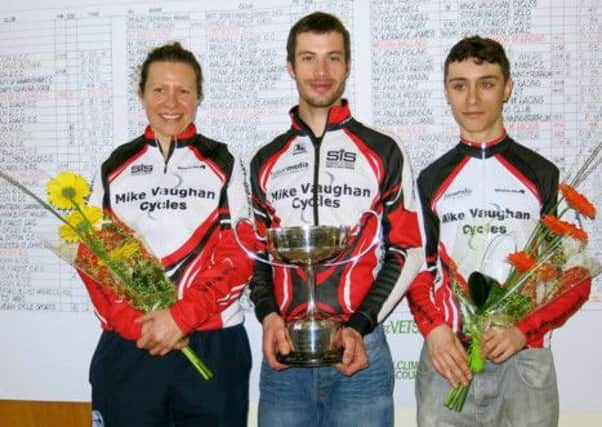 Matt Clinton, centre, with Mike Vaughan Cycles teammates Liz Powell and Jack ONeill. Picture submitted